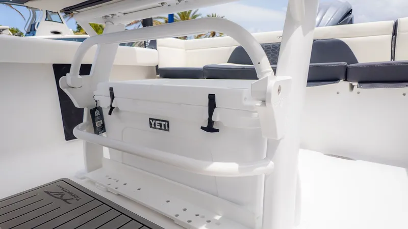 Slide: The Image of The image shows the cockpit of a Tidewater 232 LXF boat with a Yeti cooler. - 3