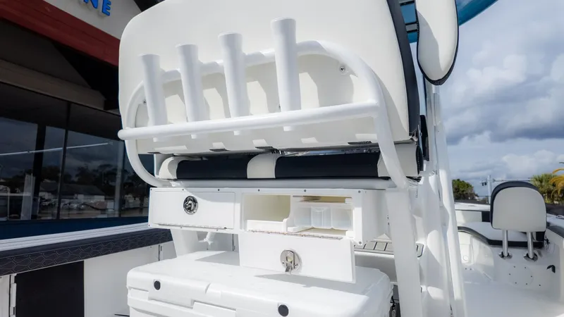 Slide: The Image of Rear view of a boat with rod holders and storage compartments. - 10