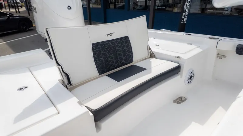 Slide: The Image of The 2026 Tidewater 2300 Carolina Bay features a stylish bench seat with a modern design. - 5