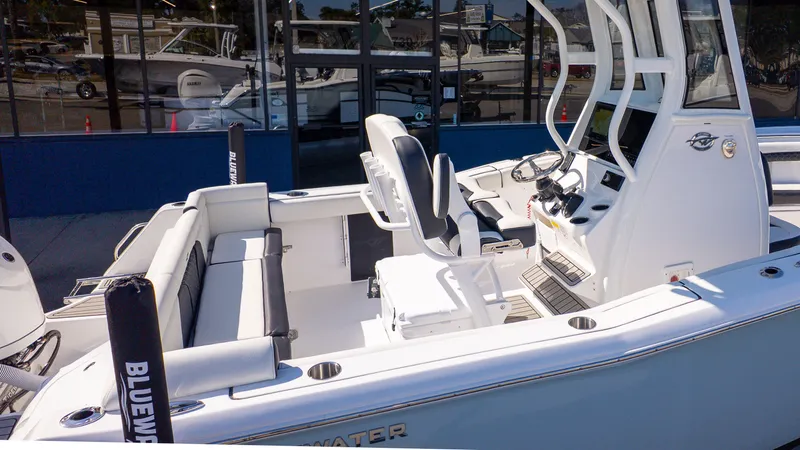 Slide: The Image of The image shows a modern boat with a sleek white cockpit and comfortable seating. - 5
