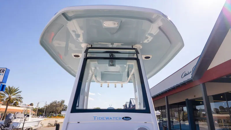 Slide: The Image of View of a Tidewater 232 LXF boat from below, featuring a sturdy roof and clear blue color. - 15