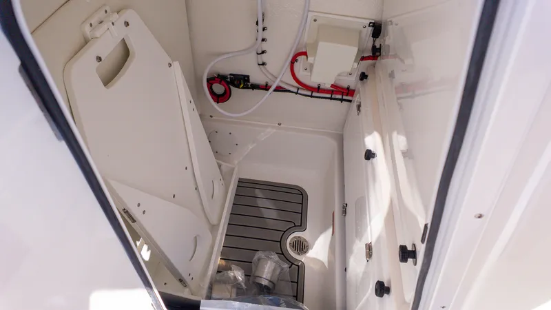 Slide: The Image of Interior view of a boat with storage space and fixtures. - 20