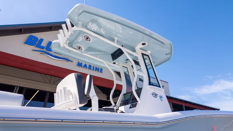 Slide: The Image of The image shows a modern boat with a sleek helm and speakers. - 22