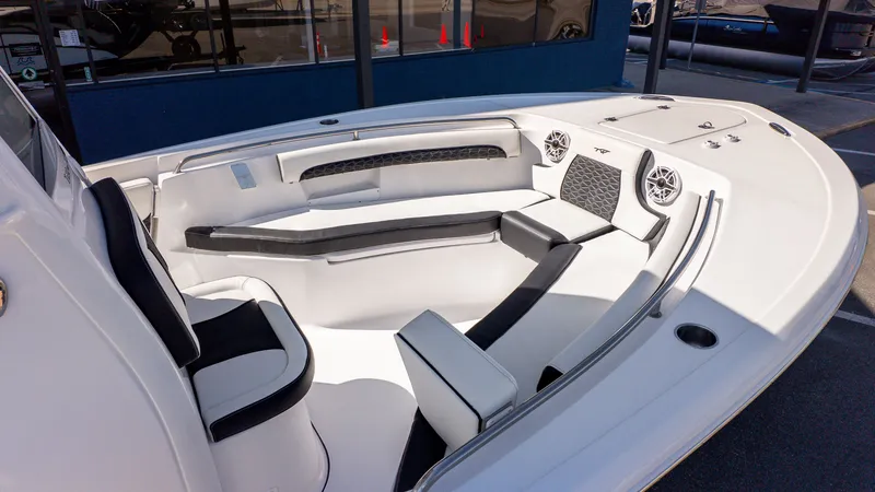 Slide: The Image of The image shows the cockpit of a 2026 Tidewater 232 LXF boat with sleek seating. - 16