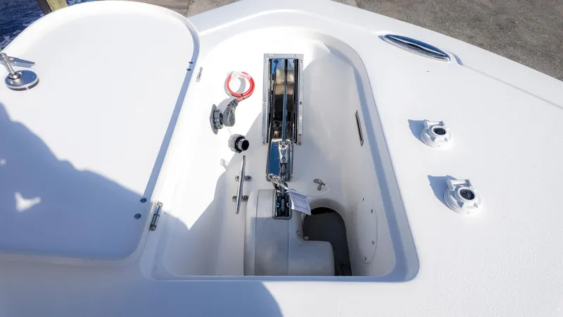 Slide: The Image of The bow of a boat with an anchor compartment and stainless steel fittings. - 21