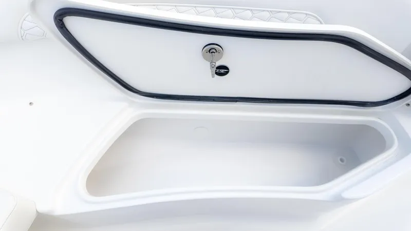 Slide: The Image of An open storage compartment with a lock inside a boat. - 20