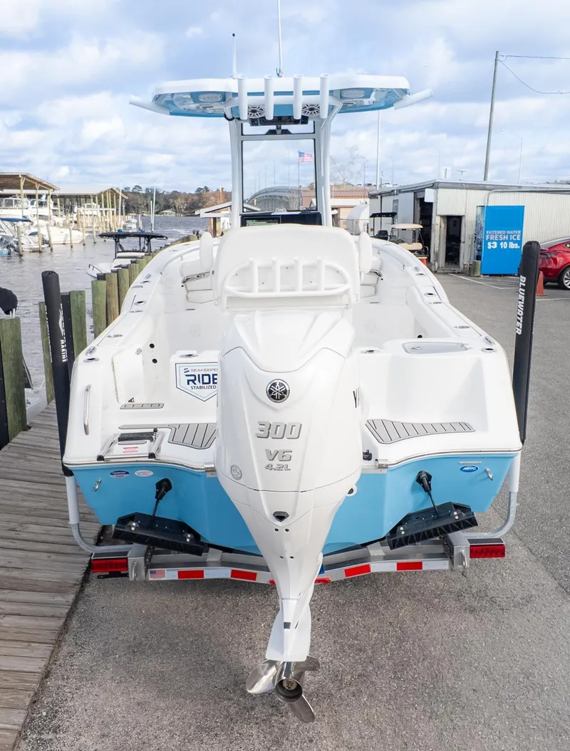 The Image of The image shows a 2026 Tidewater 232 CC Adventure boat on a trailer. - 1