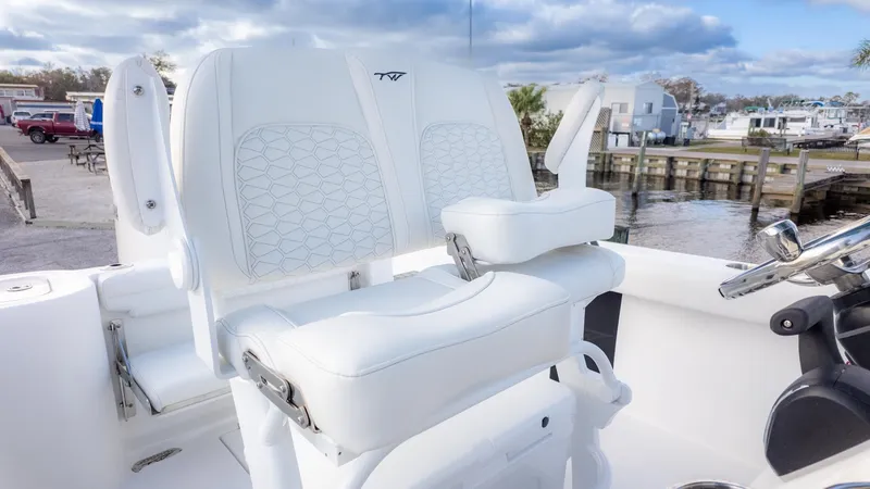 Slide: The Image of White double seat on a boat with armrests and quilted pattern. - 14