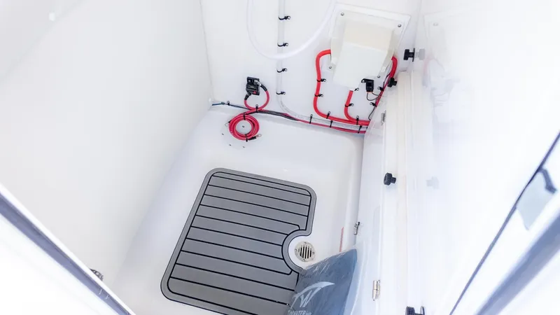 Slide: The Image of Interior of a boat with non-slip flooring and visible wiring. - 21