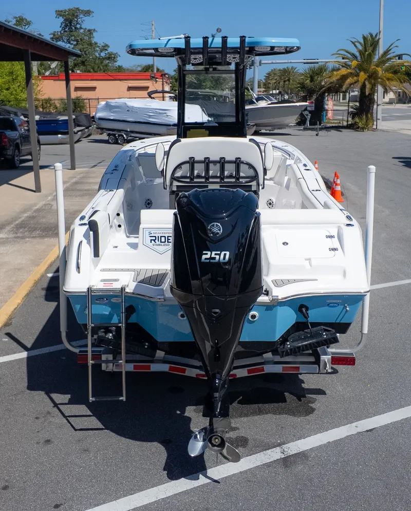 Slide: The Image of The image shows a 2026 Tidewater 232 LXF boat with a 250 HP outboard motor. - 4