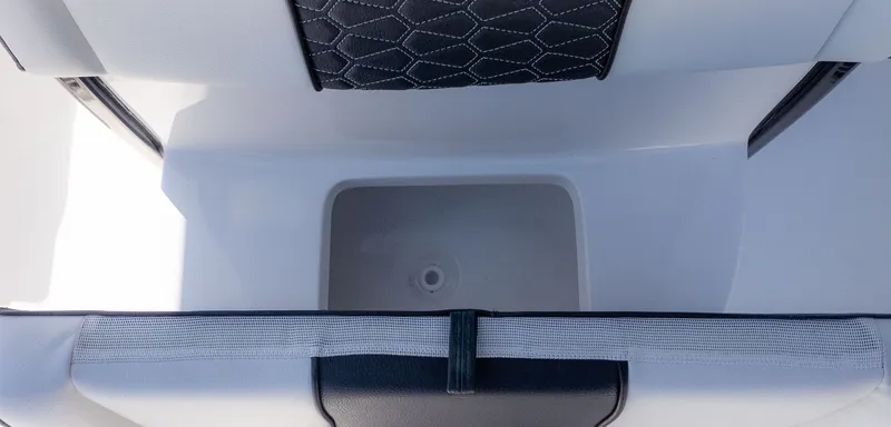 Slide: The Image of Close-up of a boat storage compartment with padded edge and black diamond pattern. - 16