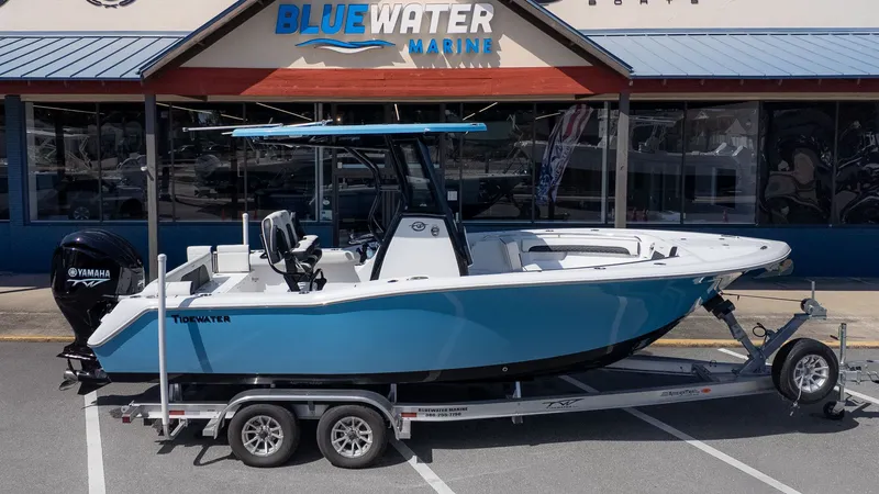 Slide: The Image of Tidewater 232 LXF 2026 on a trailer in front of a store. - 21