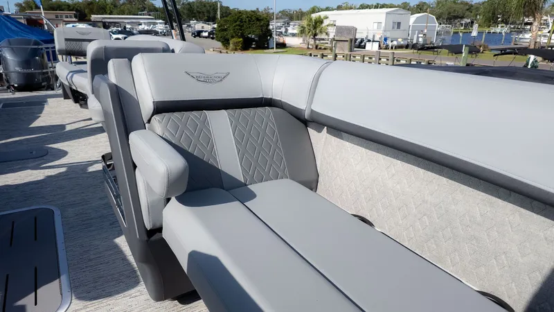 Slide: The Image of Luxurious gray upholstery on a boat with sleek stitching and armrests. - 16