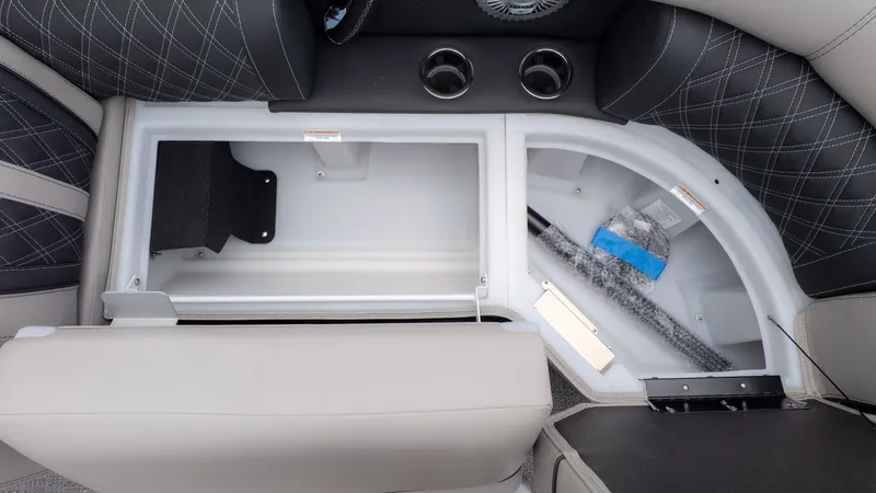 Slide: The Image of Interior view of a Barletta Lusso 23U with storage compartments and cushioned seating. - 22
