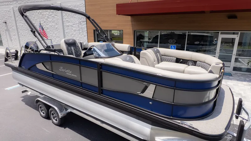 The Image of 2026 Barletta Lusso 23U on a trailer, featuring luxurious seating and modern design. - 1