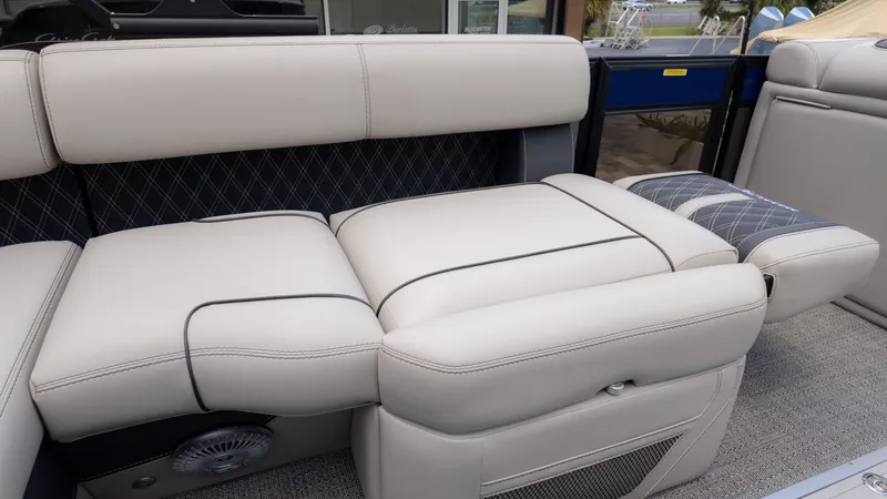 Slide: The Image of Luxurious cream-colored upholstery on a Barletta Lusso 23U boat, featuring elegant stitching and modern design. - 9