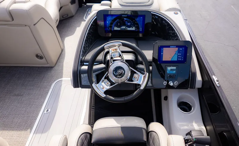 Slide: The Image of The image shows the cockpit of a 2026 Barletta Lusso L23M with modern instruments. - 23