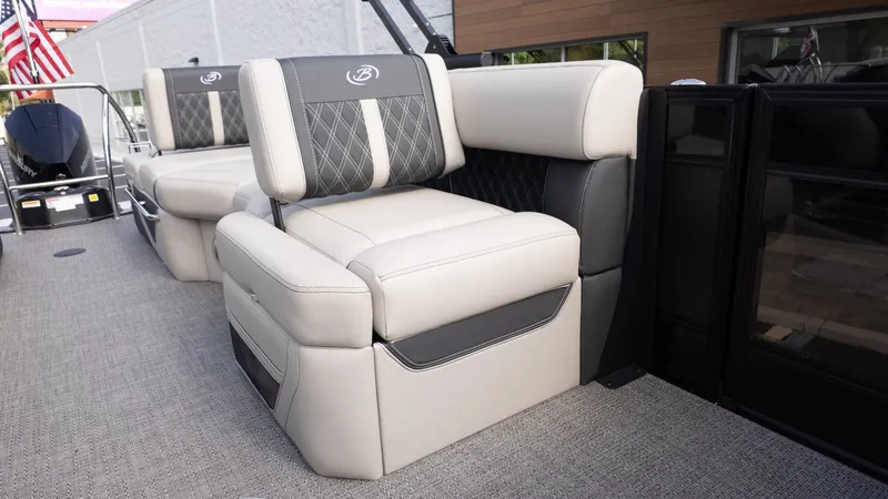 Slide: The Image of Luxurious seating on a Barletta Lusso L23M pontoon boat, featuring elegant upholstery and modern design. - 14