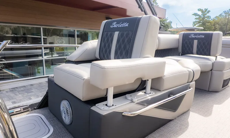 Slide: The Image of The 2026 Barletta Lusso L23M features luxurious, cushioned seating with elegant stitching. - 11