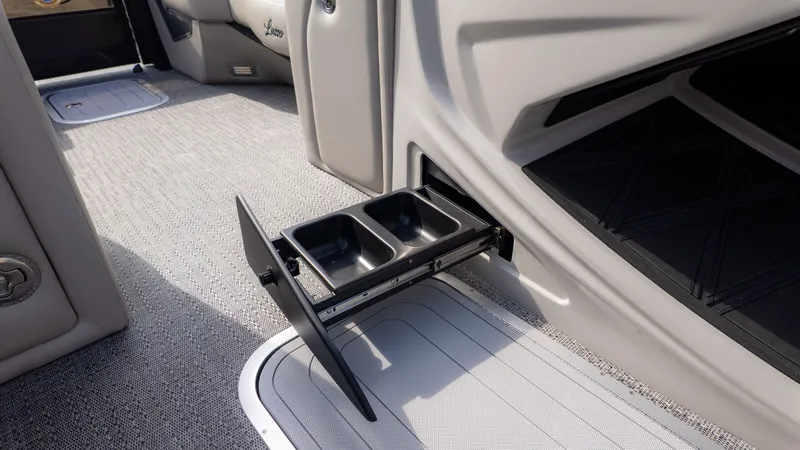 Slide: The Image of A pull-out trash bin in a sleek boat interior. - 20