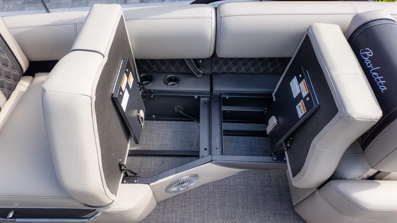 Slide: The Image of Interior view of a 2026 Barletta Lusso L23M with luxurious seating and storage space. - 14