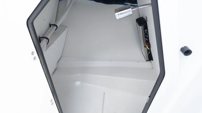 Slide: The Image of Interior of a boat with white walls and technical components. - 32