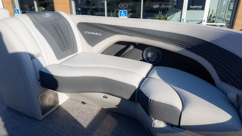 Slide: The Image of The image shows the luxurious seating of a Barletta Corsa X23U boat. - 17