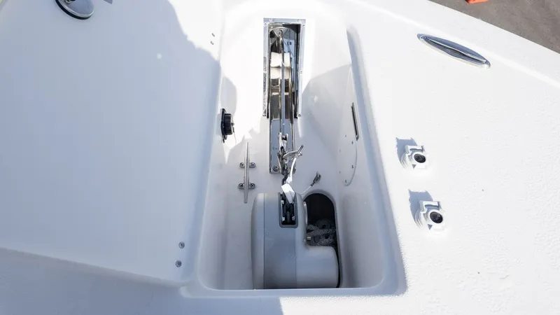 Slide: The Image of Close-up of an anchor locker on a boat, featuring chain and windlass. - 24
