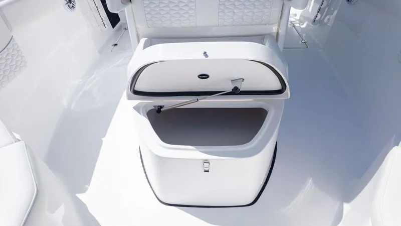 Slide: The Image of The image shows an open storage compartment on a boat with white interior. - 18