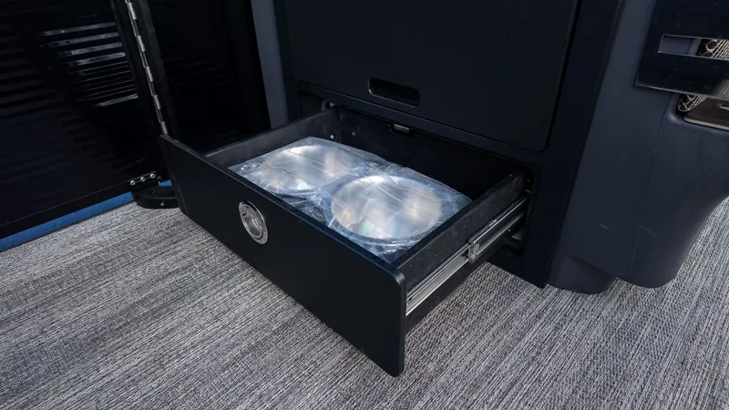 Slide: The Image of A drawer with two round containers inside a boat. - 13