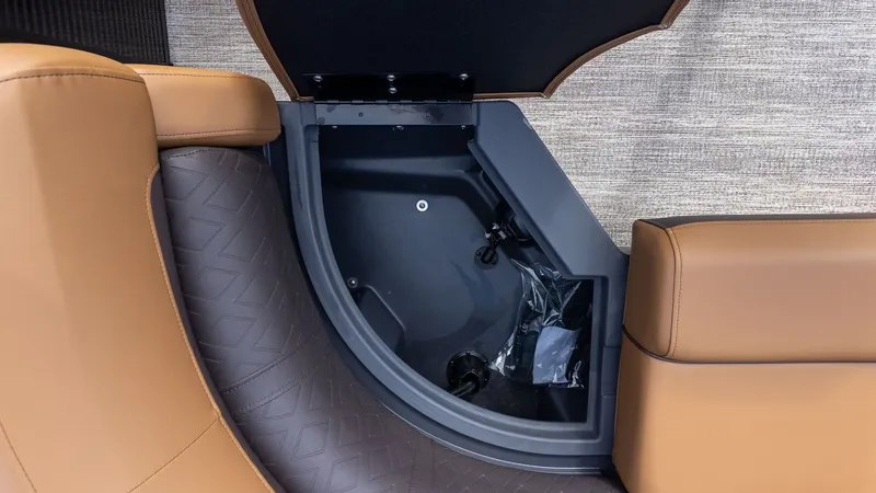 Slide: The Image of Close-up of a seating area with storage in a Bennington 26 M STERN LOUNGE boat. - 17