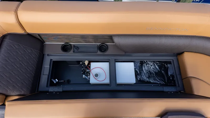 Slide: The Image of Interior view of a Bennington 26 M STERN LOUNGE with storage compartment and cup holders. - 16