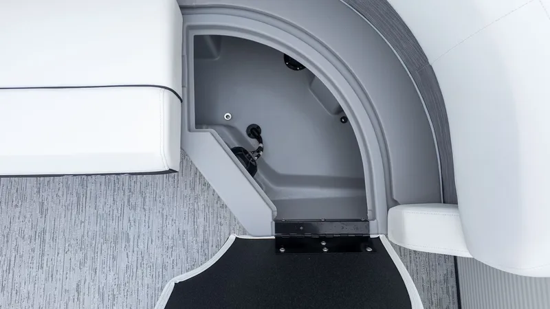 Slide: The Image of Close-up of a gray storage compartment on a boat with white upholstery. - 12