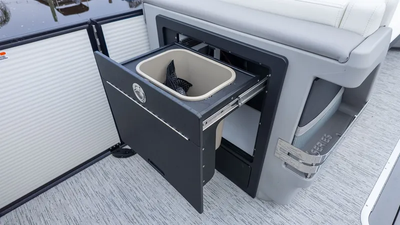 Slide: The Image of A trash bin in a cabinet on a boat. - 8