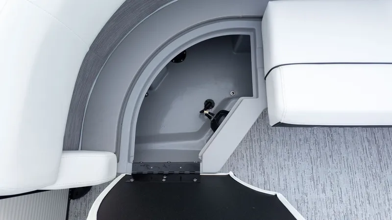 Slide: The Image of Close-up of a seating area with gray flooring and white upholstery on a boat. - 12