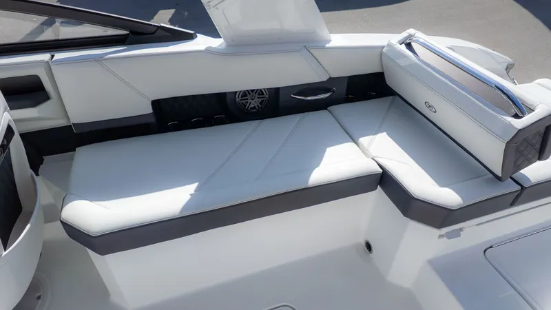 Slide: The Image of The image shows the luxurious white seating of a Cobalt R6 boat. - 3