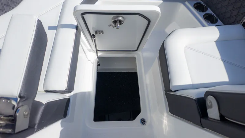 Slide: The Image of The image shows the interior of a Cobalt R6 boat with white and gray seating. - 18