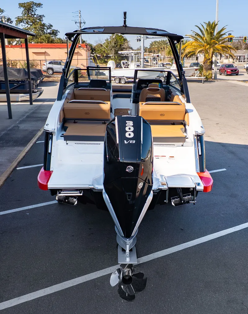Slide: The Image of The image shows a 2026 Cobalt R6B boat with a powerful outboard motor. - 4