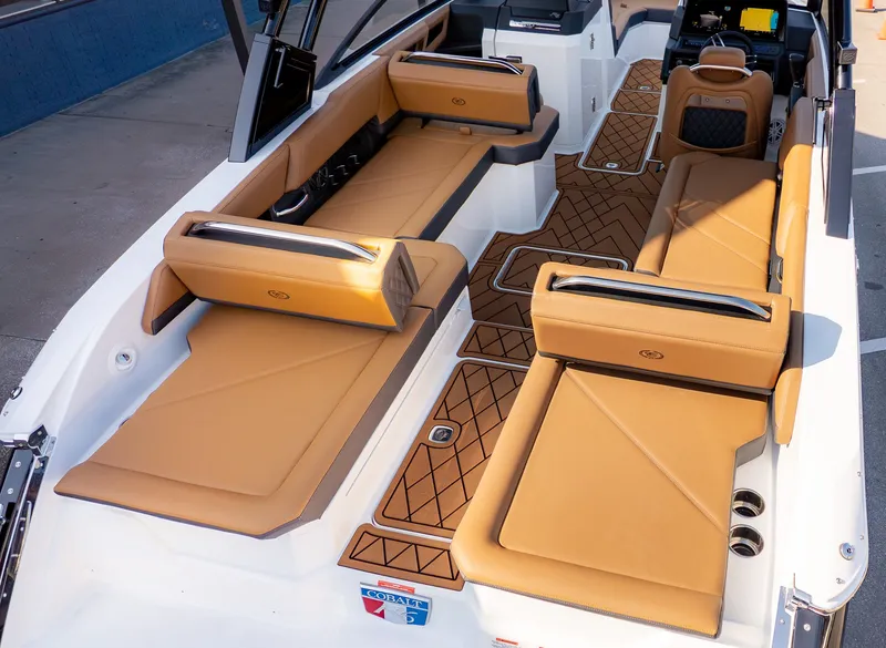 Slide: The Image of The image shows the interior of a 2026 Cobalt R6B boat with luxurious seating. - 5