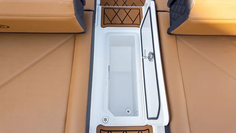 Slide: The Image of The image shows the interior of a Cobalt R6B boat with an open storage compartment. - 8