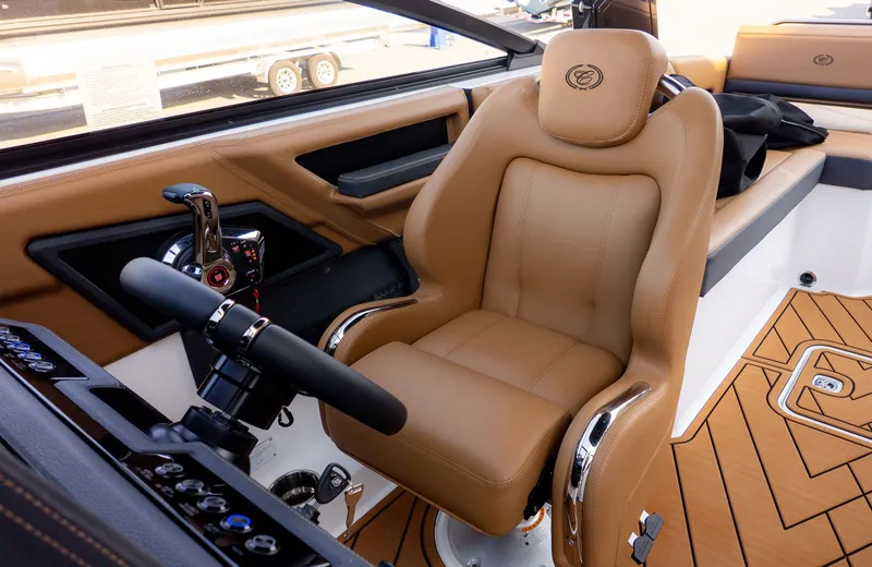 Slide: The Image of Luxurious captain's seat in a modern boat with sleek controls and stylish design. - 24