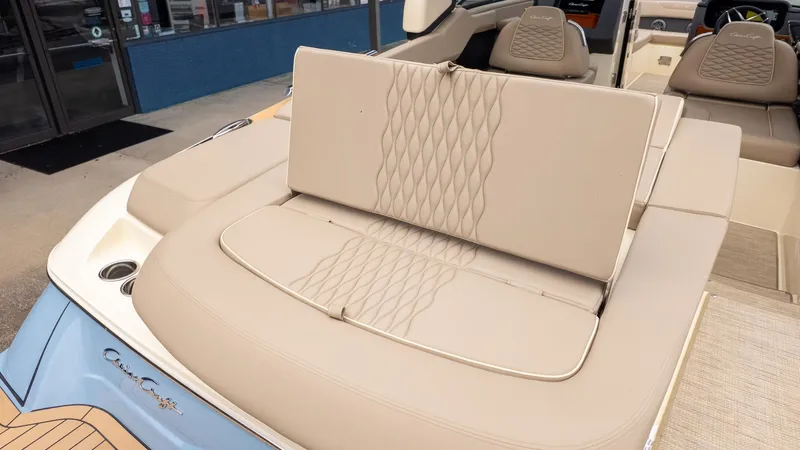 Slide: The Image of The image shows the stern of a Chris-Craft Sportster 28 with elegant beige upholstery. - 4