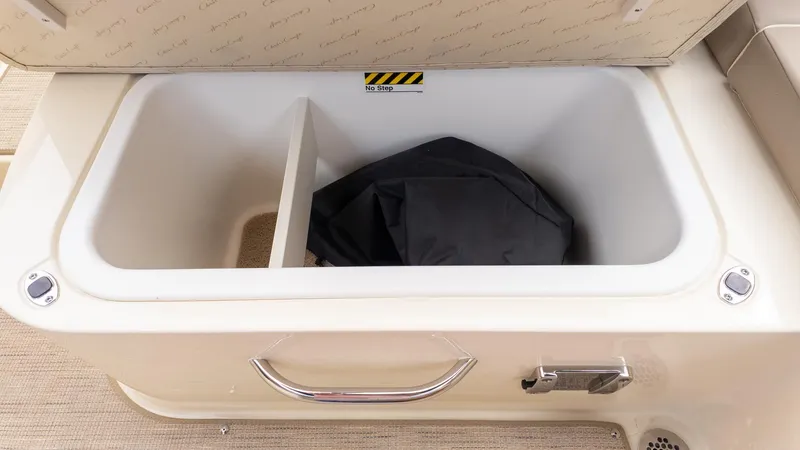 Slide: The Image of Interior view of a storage compartment on a Chris-Craft Sportster 28 boat. - 8