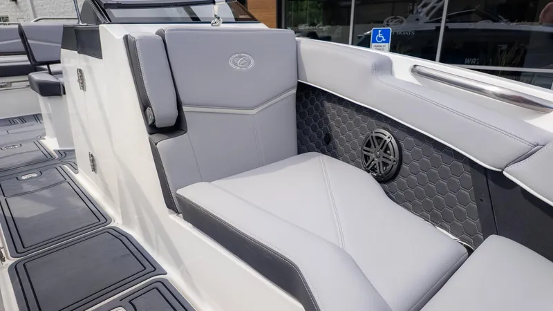 Slide: The Image of Gray upholstery with hexagonal pattern and speaker on a boat. - 22