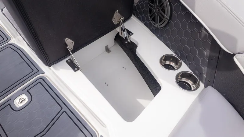 Slide: The Image of Close-up of a storage compartment on a Cobalt R6 Surf boat. - 23