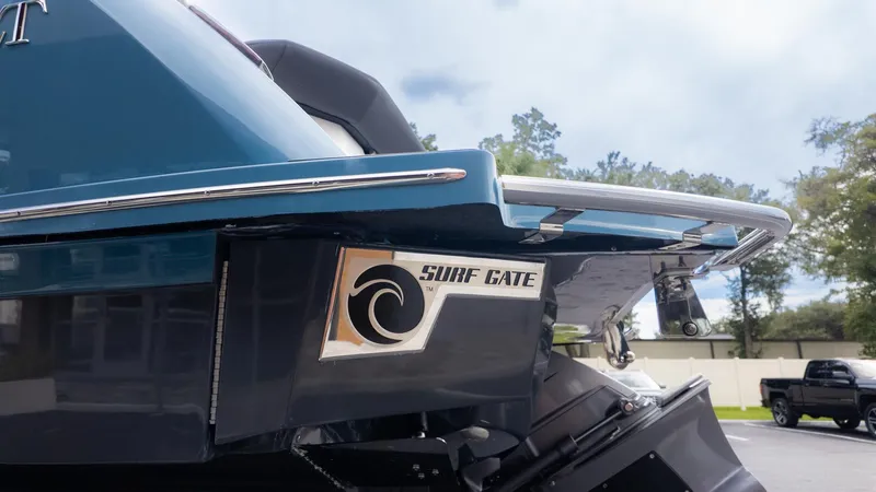 Slide: The Image of The image shows the stern of a Cobalt R6 Surf boat with a Surf Gate. - 5