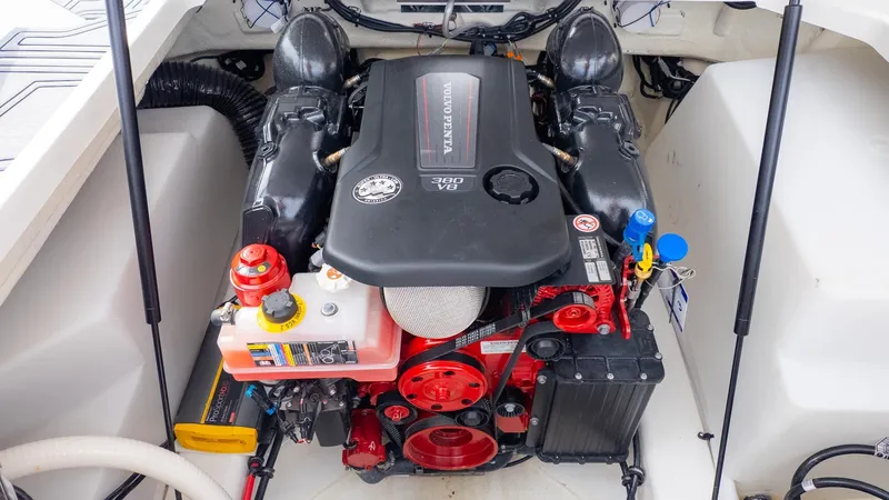 Slide: The Image of The engine compartment of a 2026 Cobalt R6 Surf boat features a powerful Volvo Penta V8 engine. - 14