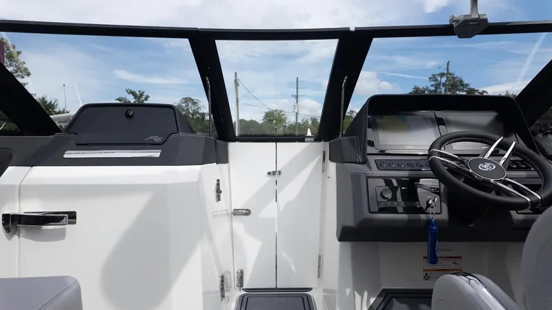 Slide: The Image of The cockpit of the 2026 Cobalt R6 Surf with modern steering and instruments. - 20