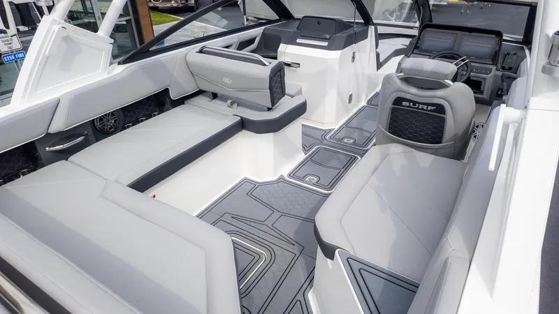 Slide: The Image of Interior of a modern boat with gray upholstery and a helm station. - 8