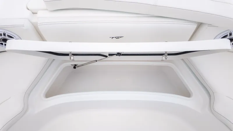 Slide: The Image of An open storage compartment on a 2026 Tidewater 2700 Carolina Bay boat. - 17